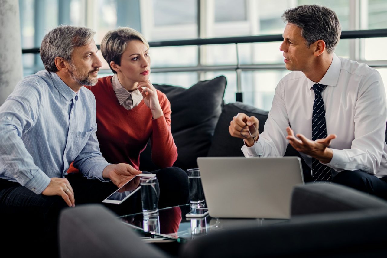 Folks talking in office